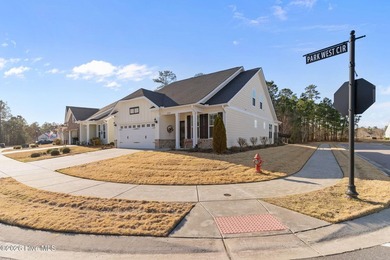 Immaculate 3-bedroom, home with bonus room on a desirable corner on Cape Fear National At Brunswick Forest in North Carolina - for sale on GolfHomes.com, golf home, golf lot