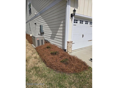 Immaculate 3-bedroom, home with bonus room on a desirable corner on Cape Fear National At Brunswick Forest in North Carolina - for sale on GolfHomes.com, golf home, golf lot
