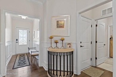 Immaculate 3-bedroom, home with bonus room on a desirable corner on Cape Fear National At Brunswick Forest in North Carolina - for sale on GolfHomes.com, golf home, golf lot