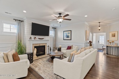 Immaculate 3-bedroom, home with bonus room on a desirable corner on Cape Fear National At Brunswick Forest in North Carolina - for sale on GolfHomes.com, golf home, golf lot