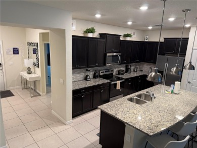 Professionally Designed, Fully Furnished 5-Bedroom Townhome in on Polo Park East in Florida - for sale on GolfHomes.com, golf home, golf lot