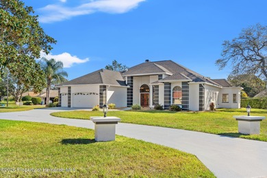 Welcome home to this beautiful Lindhorst-built pool home on Glen Lakes Country Club in Florida - for sale on GolfHomes.com, golf home, golf lot