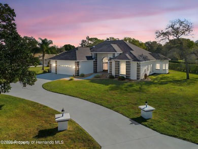 Welcome home to this beautiful Lindhorst-built pool home on Glen Lakes Country Club in Florida - for sale on GolfHomes.com, golf home, golf lot