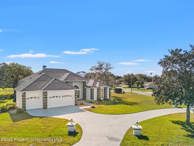 Welcome home to this beautiful Lindhorst-built pool home on Glen Lakes Country Club in Florida - for sale on GolfHomes.com, golf home, golf lot