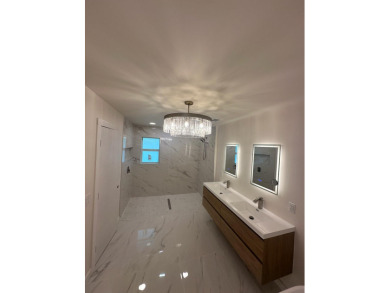 TURNKEY3-bed/3-bath CBS block home on a rare 1-acre lot with on Evergreen Club in Florida - for sale on GolfHomes.com, golf home, golf lot