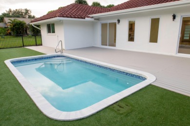 TURNKEY3-bed/3-bath CBS block home on a rare 1-acre lot with on Evergreen Club in Florida - for sale on GolfHomes.com, golf home, golf lot
