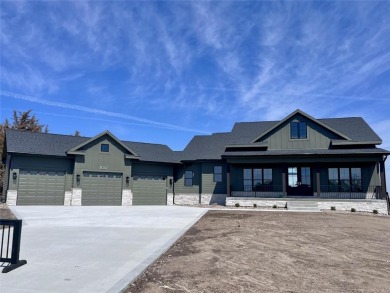 The Colson walkout ranch plan sits on nearly 1-acre lot backing on Jester Park Golf Course in Iowa - for sale on GolfHomes.com, golf home, golf lot