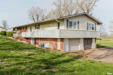 Welcome to Your Dream Home! This stunningly remodeled 3-bedroom on Shawnee Hills Country Club in Illinois - for sale on GolfHomes.com, golf home, golf lot