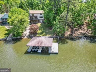 Welcome to this beautifully renovated lakefront home located in on Turtle Cove Golf Course in Georgia - for sale on GolfHomes.com, golf home, golf lot