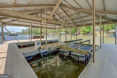 Welcome to this beautifully renovated lakefront home located in on Turtle Cove Golf Course in Georgia - for sale on GolfHomes.com, golf home, golf lot