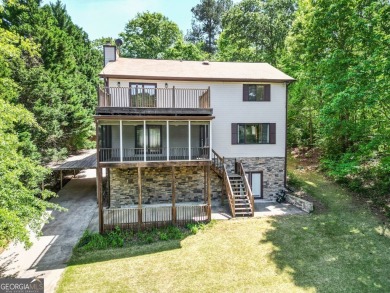 Welcome to this beautifully renovated lakefront home located in on Turtle Cove Golf Course in Georgia - for sale on GolfHomes.com, golf home, golf lot