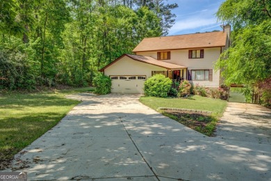 Welcome to this beautifully renovated lakefront home located in on Turtle Cove Golf Course in Georgia - for sale on GolfHomes.com, golf home, golf lot