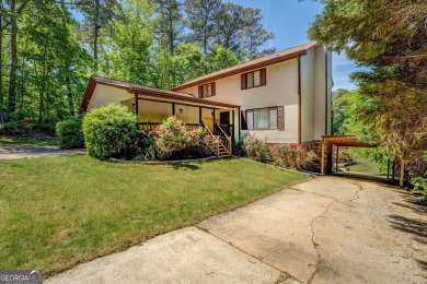 Welcome to this beautifully renovated lakefront home located in on Turtle Cove Golf Course in Georgia - for sale on GolfHomes.com, golf home, golf lot