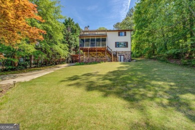 Welcome to this beautifully renovated lakefront home located in on Turtle Cove Golf Course in Georgia - for sale on GolfHomes.com, golf home, golf lot