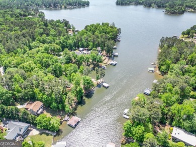 Welcome to this beautifully renovated lakefront home located in on Turtle Cove Golf Course in Georgia - for sale on GolfHomes.com, golf home, golf lot