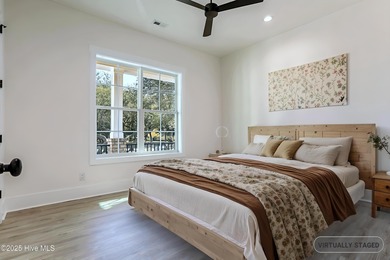 Cradled by the gentle currents where the Shallotte River meets on Lockwood Folly Country Club in North Carolina - for sale on GolfHomes.com, golf home, golf lot