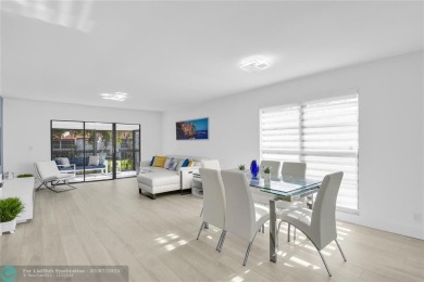 FURNISHED LAKEFRONT CORNER UNIT CONDO in the desirable Cypresses on Boca Lago Golf and Country Club in Florida - for sale on GolfHomes.com, golf home, golf lot