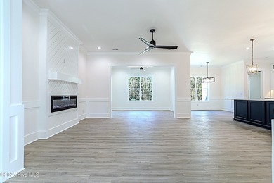 Cradled by the gentle currents where the Shallotte River meets on Lockwood Folly Country Club in North Carolina - for sale on GolfHomes.com, golf home, golf lot