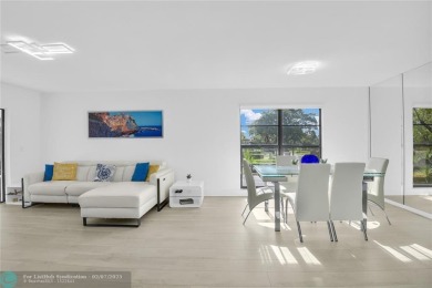 FURNISHED LAKEFRONT CORNER UNIT CONDO in the desirable Cypresses on Boca Lago Golf and Country Club in Florida - for sale on GolfHomes.com, golf home, golf lot