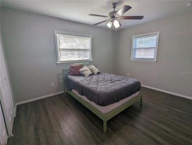 This beautifully maintained three-bedroom, two-bathroom home on The Dunedin Country Club in Florida - for sale on GolfHomes.com, golf home, golf lot