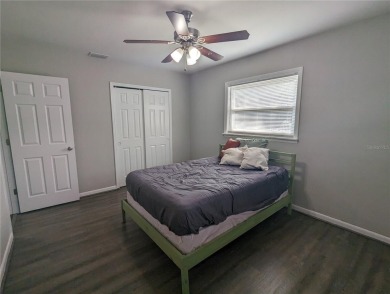 This beautifully maintained three-bedroom, two-bathroom home on The Dunedin Country Club in Florida - for sale on GolfHomes.com, golf home, golf lot