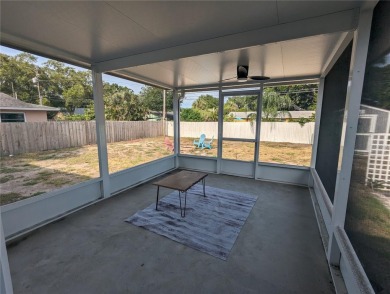 This beautifully maintained three-bedroom, two-bathroom home on The Dunedin Country Club in Florida - for sale on GolfHomes.com, golf home, golf lot