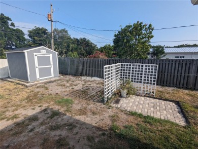 This beautifully maintained three-bedroom, two-bathroom home on The Dunedin Country Club in Florida - for sale on GolfHomes.com, golf home, golf lot