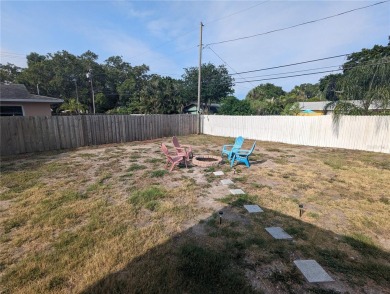 This beautifully maintained three-bedroom, two-bathroom home on The Dunedin Country Club in Florida - for sale on GolfHomes.com, golf home, golf lot
