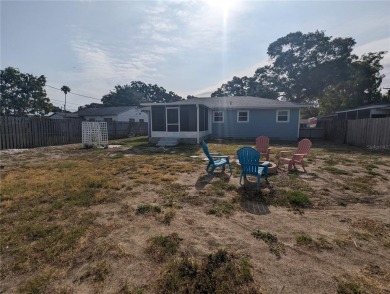 This beautifully maintained three-bedroom, two-bathroom home on The Dunedin Country Club in Florida - for sale on GolfHomes.com, golf home, golf lot