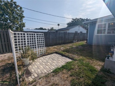 This beautifully maintained three-bedroom, two-bathroom home on The Dunedin Country Club in Florida - for sale on GolfHomes.com, golf home, golf lot
