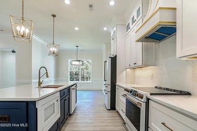 Cradled by the gentle currents where the Shallotte River meets on Lockwood Folly Country Club in North Carolina - for sale on GolfHomes.com, golf home, golf lot