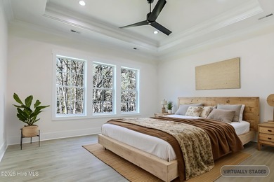 Cradled by the gentle currents where the Shallotte River meets on Lockwood Folly Country Club in North Carolina - for sale on GolfHomes.com, golf home, golf lot