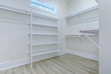 Cradled by the gentle currents where the Shallotte River meets on Lockwood Folly Country Club in North Carolina - for sale on GolfHomes.com, golf home, golf lot