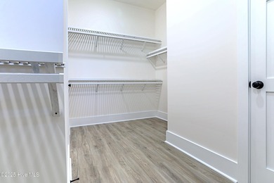 Cradled by the gentle currents where the Shallotte River meets on Lockwood Folly Country Club in North Carolina - for sale on GolfHomes.com, golf home, golf lot