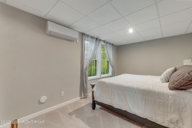 Modern 5-Bedroom Home in Pinecrest Lake Golf & Country Club on Pinecrest Lake Golf and Country Club in Pennsylvania - for sale on GolfHomes.com, golf home, golf lot