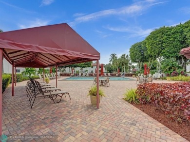 FURNISHED LAKEFRONT CORNER UNIT CONDO in the desirable Cypresses on Boca Lago Golf and Country Club in Florida - for sale on GolfHomes.com, golf home, golf lot