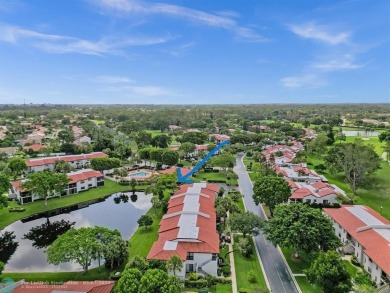 FURNISHED LAKEFRONT CORNER UNIT CONDO in the desirable Cypresses on Boca Lago Golf and Country Club in Florida - for sale on GolfHomes.com, golf home, golf lot