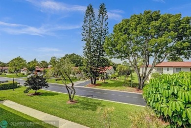 FURNISHED LAKEFRONT CORNER UNIT CONDO in the desirable Cypresses on Boca Lago Golf and Country Club in Florida - for sale on GolfHomes.com, golf home, golf lot