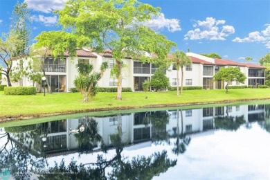 FURNISHED LAKEFRONT CORNER UNIT CONDO in the desirable Cypresses on Boca Lago Golf and Country Club in Florida - for sale on GolfHomes.com, golf home, golf lot