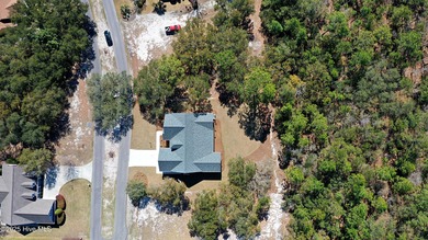 Cradled by the gentle currents where the Shallotte River meets on Lockwood Folly Country Club in North Carolina - for sale on GolfHomes.com, golf home, golf lot