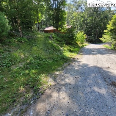 Priced to sell!  This gentle uphill lot near the Beech Mountain on Beech Mountain Club in North Carolina - for sale on GolfHomes.com, golf home, golf lot