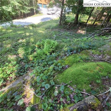 Priced to sell!  This gentle uphill lot near the Beech Mountain on Beech Mountain Club in North Carolina - for sale on GolfHomes.com, golf home, golf lot