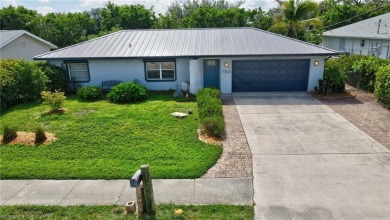 Welcome to this inviting 3-bedroom, 2-bathroom single-family on Estero Country Club in Florida - for sale on GolfHomes.com, golf home, golf lot