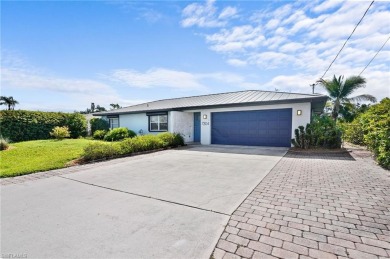 Welcome to this inviting 3-bedroom, 2-bathroom single-family on Estero Country Club in Florida - for sale on GolfHomes.com, golf home, golf lot
