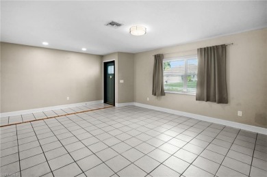 Welcome to this inviting 3-bedroom, 2-bathroom single-family on Estero Country Club in Florida - for sale on GolfHomes.com, golf home, golf lot