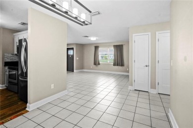 Welcome to this inviting 3-bedroom, 2-bathroom single-family on Estero Country Club in Florida - for sale on GolfHomes.com, golf home, golf lot