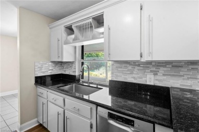 Welcome to this inviting 3-bedroom, 2-bathroom single-family on Estero Country Club in Florida - for sale on GolfHomes.com, golf home, golf lot