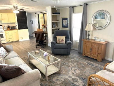 Discover this beautifully updated 2-bedroom, 2-bathroom home on Crystal Lake Club in Florida - for sale on GolfHomes.com, golf home, golf lot