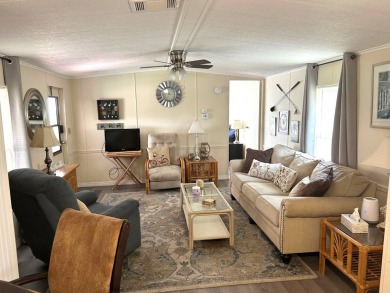 Discover this beautifully updated 2-bedroom, 2-bathroom home on Crystal Lake Club in Florida - for sale on GolfHomes.com, golf home, golf lot
