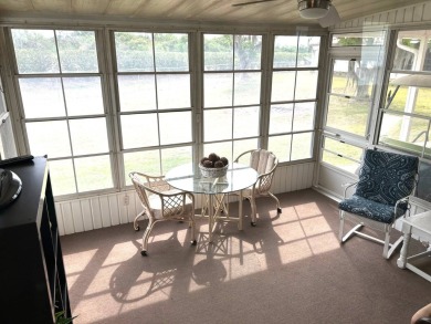 Discover this beautifully updated 2-bedroom, 2-bathroom home on Crystal Lake Club in Florida - for sale on GolfHomes.com, golf home, golf lot